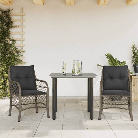 Shadow Haven: 3-Piece Garden Dining Set in Black Poly Rattan with Cushions