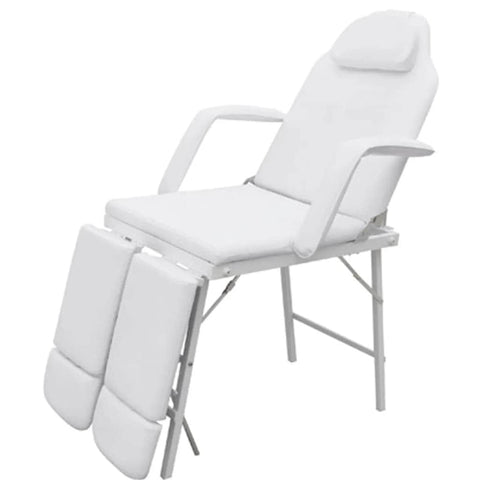 White treatment chair with ajustable legrests